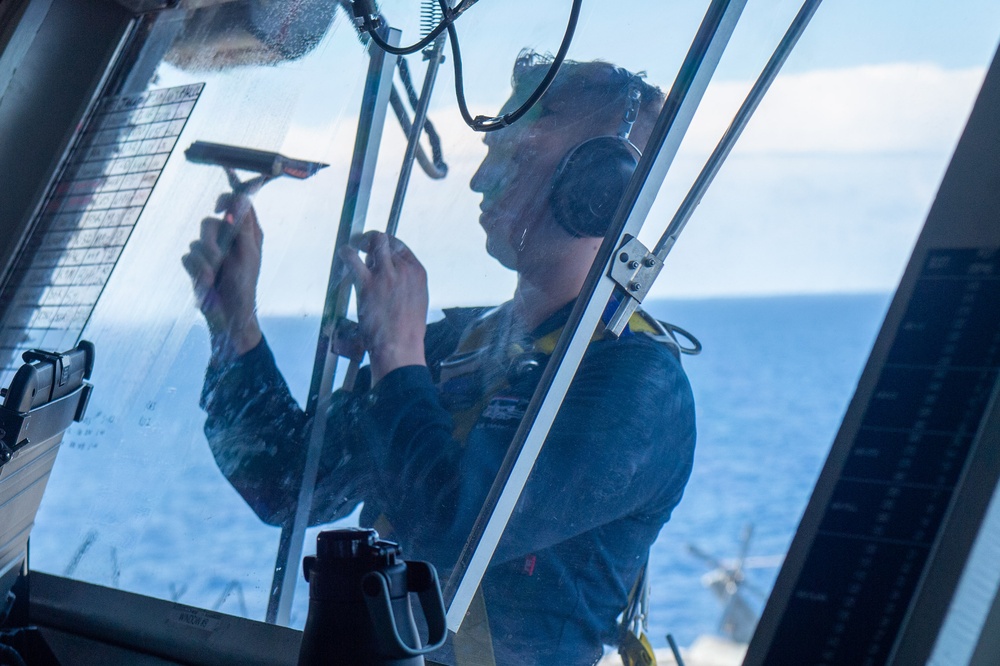 USS Ronald Reagan (CVN 76) Sailors stand watch in the pilot house