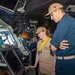 USS Ronald Reagan (CVN 76) Sailors stand watch in the pilot house