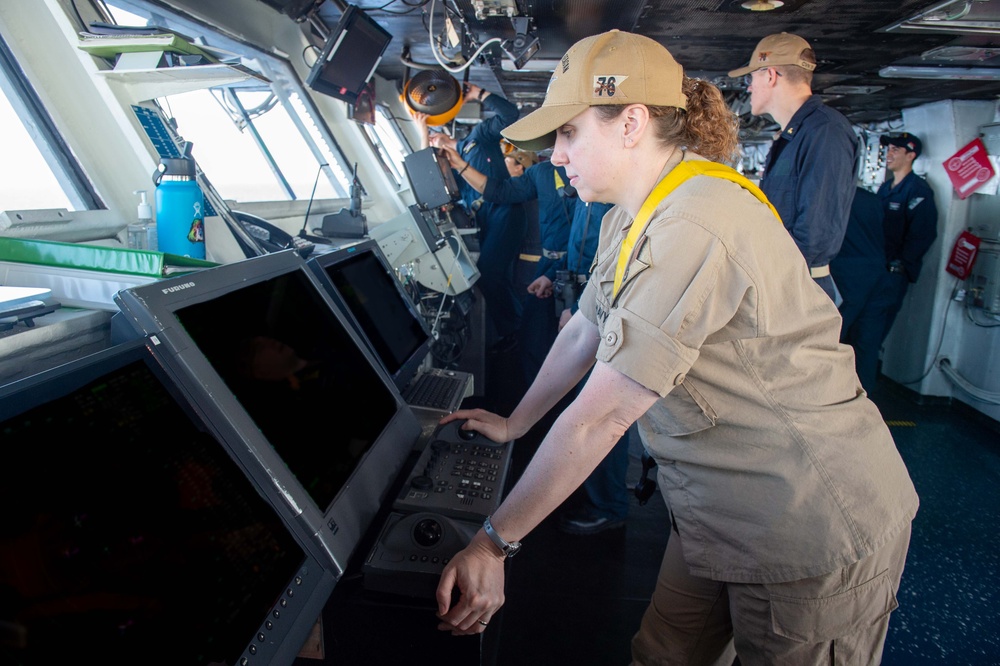 USS Ronald Reagan (CVN 76) Sailors stand watch in the pilot house