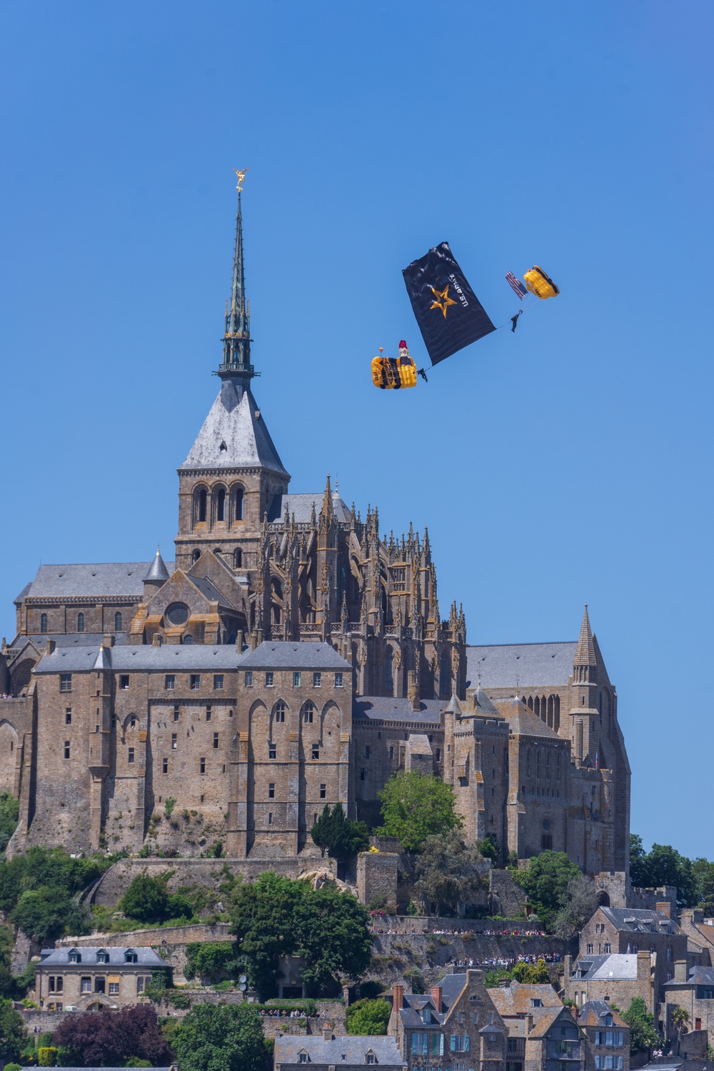 Soldiers from Army Golden Knights jump at Mont Saint- Michel Normandy, France for D-Day commemoration ceremonies