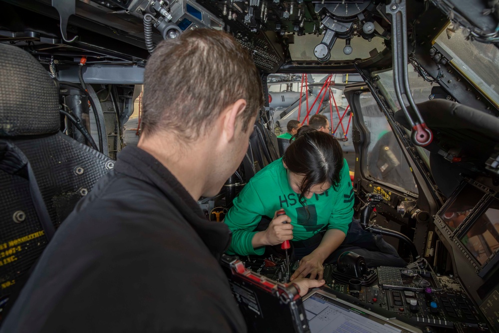 Sailors conduct maintenance aboard Abraham Lincoln