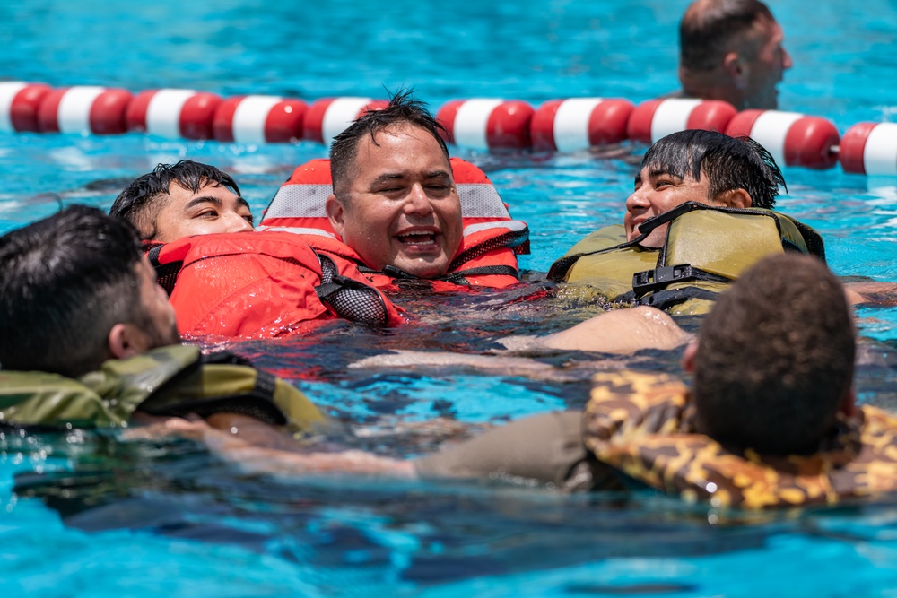 Hawaii Army National Guard MEDEVAC Units Practice Water Survival Training