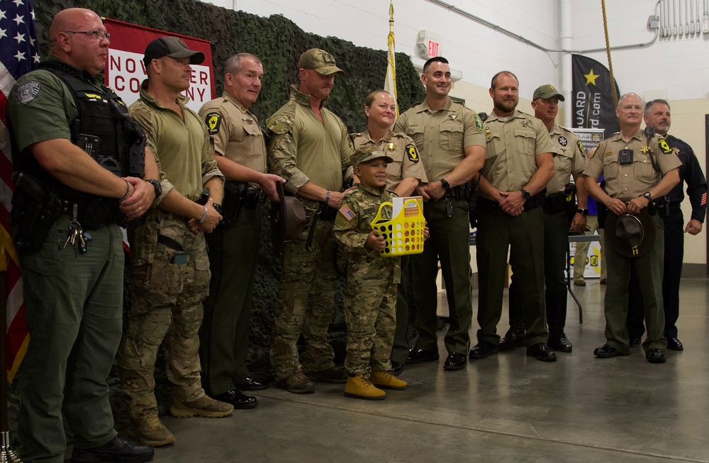 Seven-Year-Old Made Honorary First Sergeant in Illinois Army National Guard for Courage Against Cancer