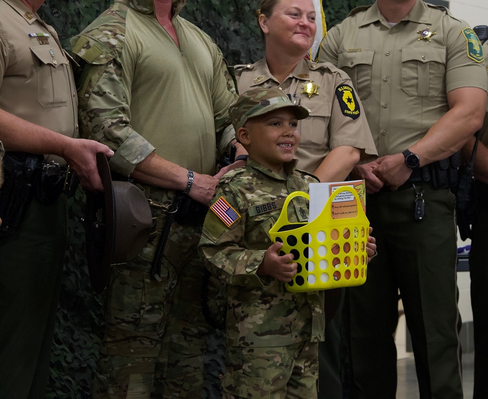 Seven-Year-Old Made Honorary First Sergeant in Illinois Army National Guard for Courage Against Cancer