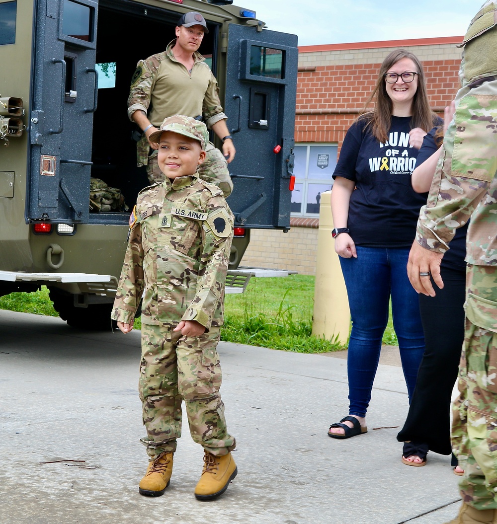 Seven-Year-Old Made Honorary First Sergeant in Illinois Army National Guard for Courage Against Cancer