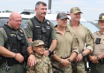 Seven-Year-Old Made Honorary First Sergeant in Illinois Army National Guard for Courage Against Cancer