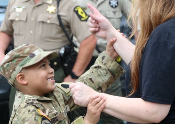 Seven-Year-Old Made Honorary First Sergeant in Illinois Army National Guard for Courage Against Cancer