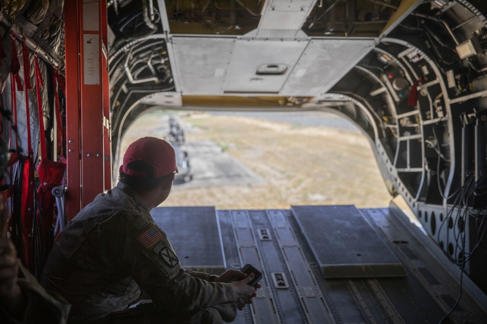 Chinook performs sling load operations at Fort Hunter Liggett