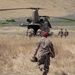 Chinook performs sling load operations at Fort Hunter Liggett