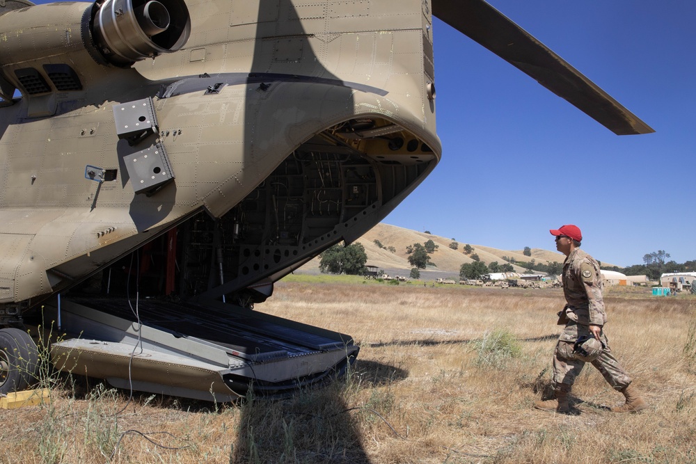 Chinook performs sling load operations at Fort Hunter Liggett