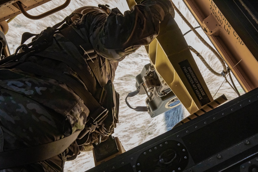 Chinook performs sling load operations at Fort Hunter Liggett