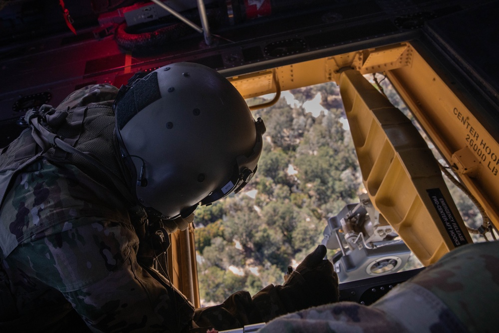 Chinook performs sling load operations at Fort Hunter Liggett