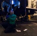 Sailors conduct aviation maintenance aboard Abraham Lincoln