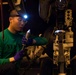 Sailors conduct aviation maintenance aboard Abraham Lincoln