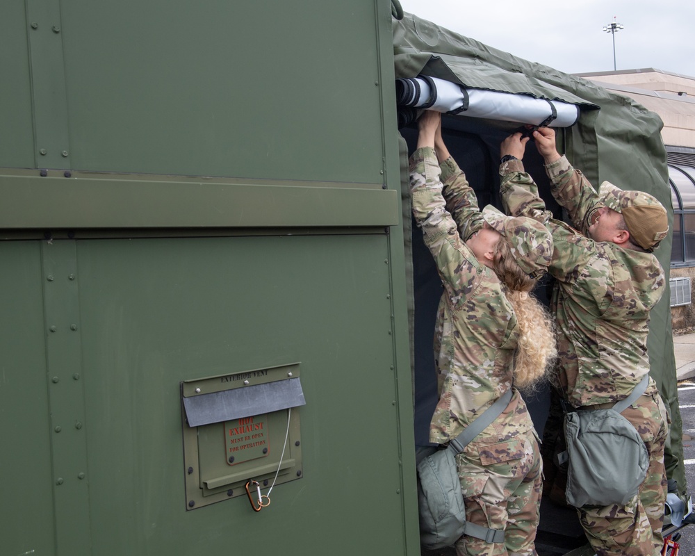 Airmen demonstrate expeditionary kitchen setup during Exercise Iron Keystone 24