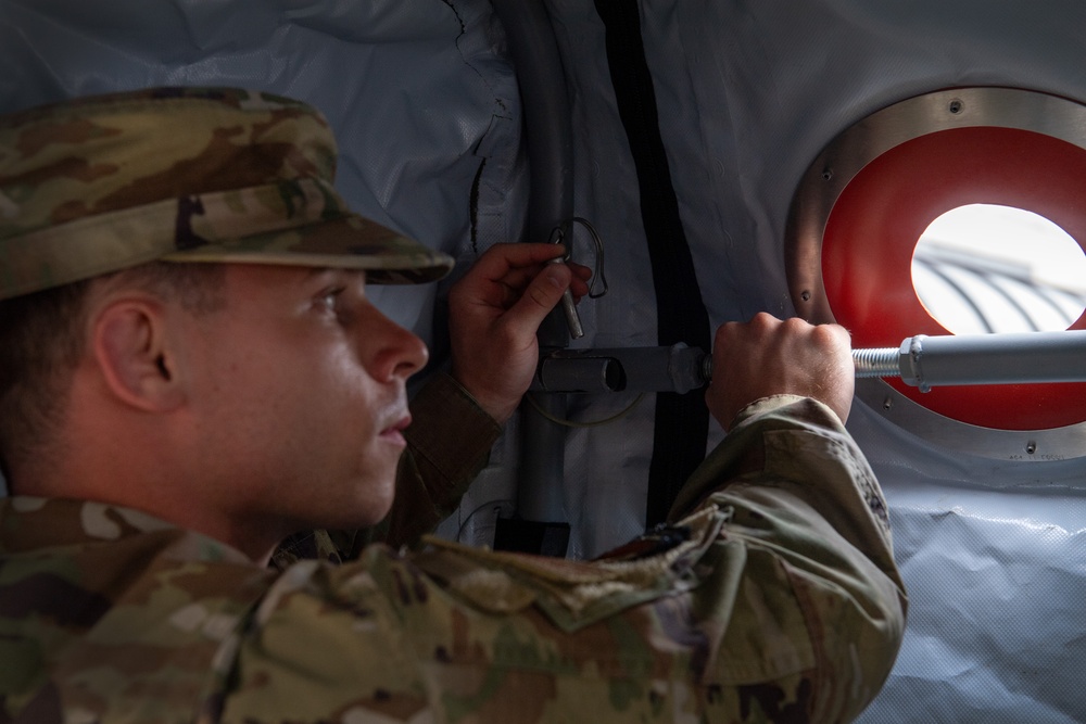 Airmen demonstrate expeditionary kitchen setup during Exercise Iron Keystone 24