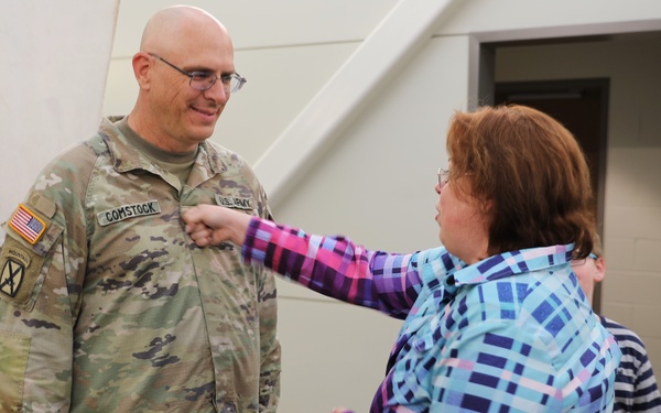 Sgt. 1st. Class promoted at Division Headquarters by family