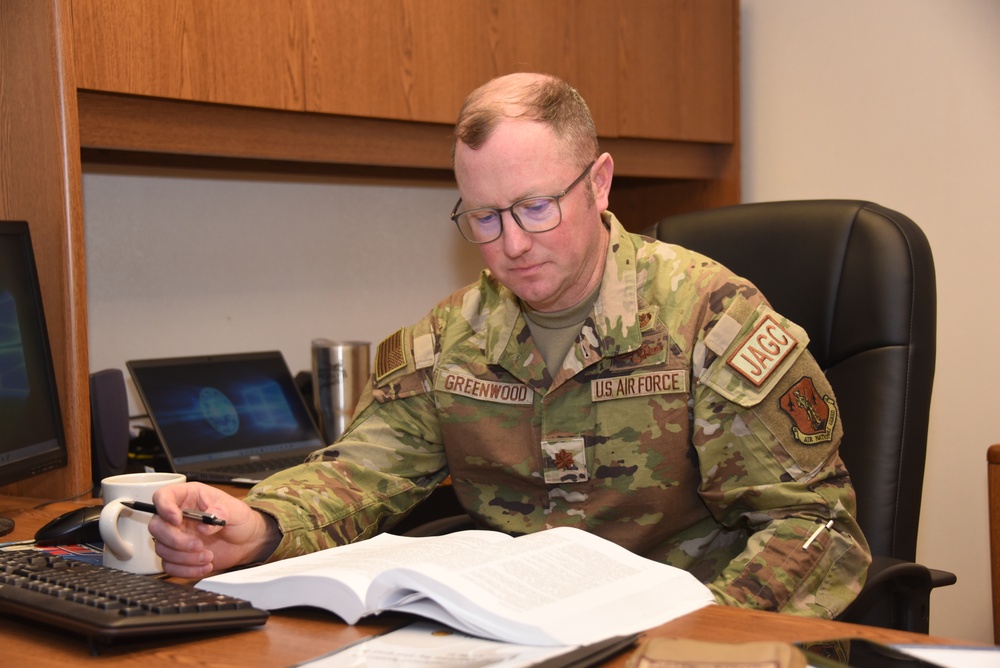 Maj. Patrick Greenwood works in the Judge Advocate General office