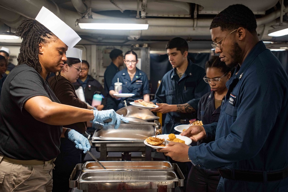 USS Ronald Reagan (CVN 76) Sailors serve Sunday brunch