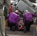 Sailors participate in a medical emergency drill aboard Abraham Lincoln