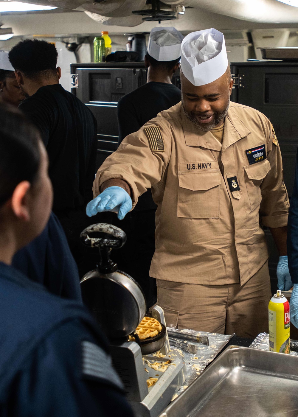 USS Ronald Reagan (CVN 76) Sailors serve Sunday brunch