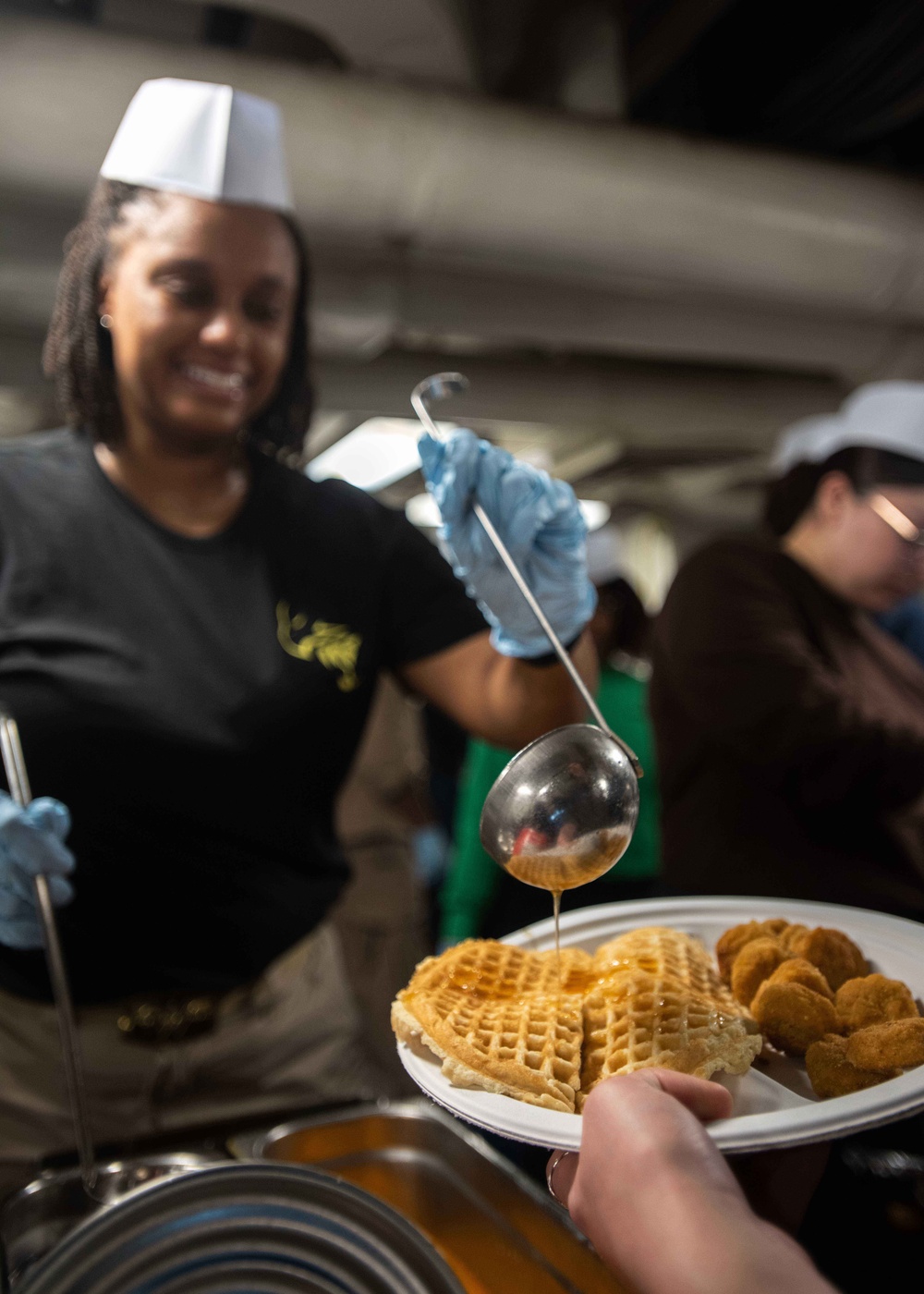 USS Ronald Reagan (CVN 76) Sailors serve Sunday brunch