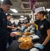 USS Ronald Reagan (CVN 76) Sailors serve Sunday brunch