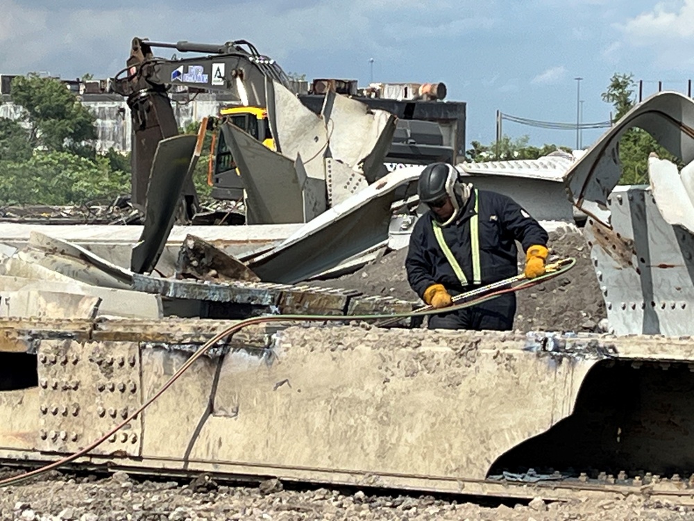 Workers carve up steel wreckage at Sparrows Point, as Unified Command nears restoration of Baltimore's Federal Channel