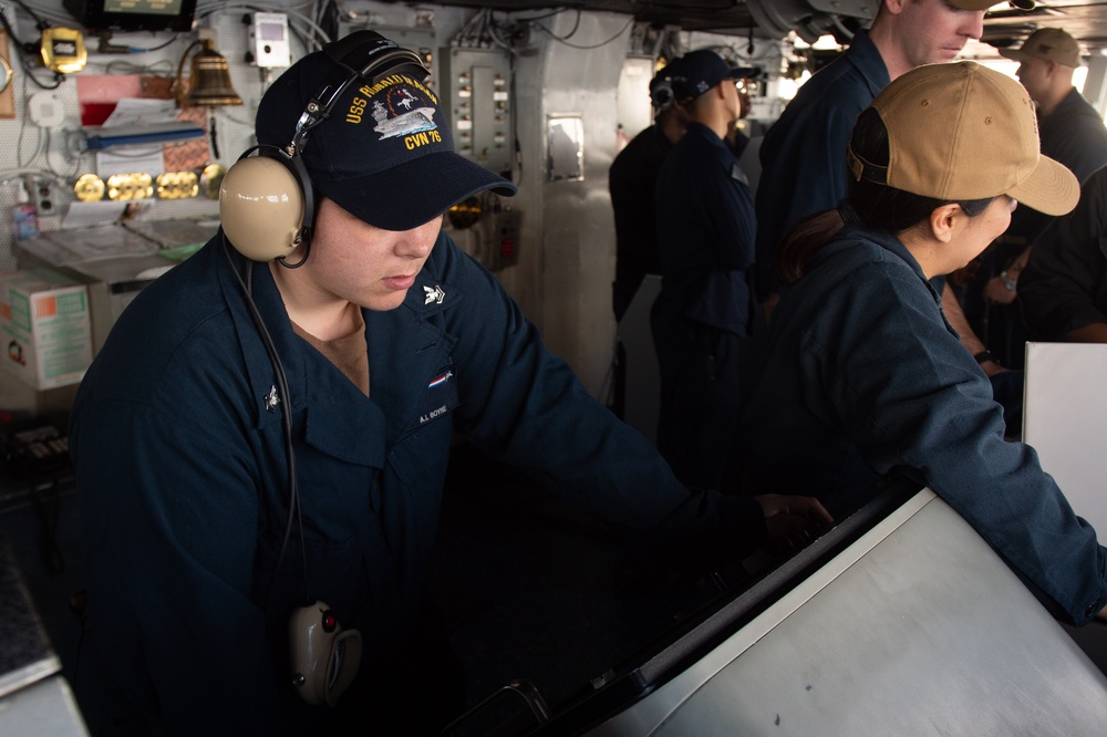 USS Ronald Reagan (CVN 76) Sailors stand watch in the pilot house
