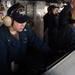 USS Ronald Reagan (CVN 76) Sailors stand watch in the pilot house
