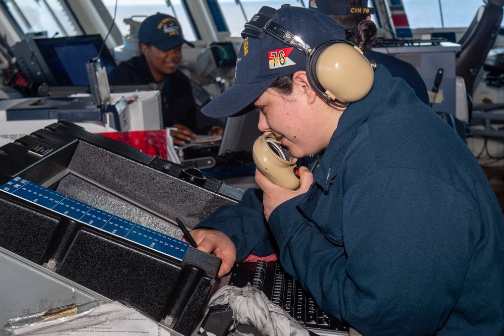 USS Ronald Reagan (CVN 76) Sailors stand watch in the pilot house