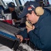 USS Ronald Reagan (CVN 76) Sailors stand watch in the pilot house