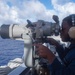 USS Ronald Reagan (CVN 76) Sailors stand watch in the pilot house