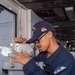 USS Ronald Reagan (CVN 76) Sailors stand watch in the pilot house