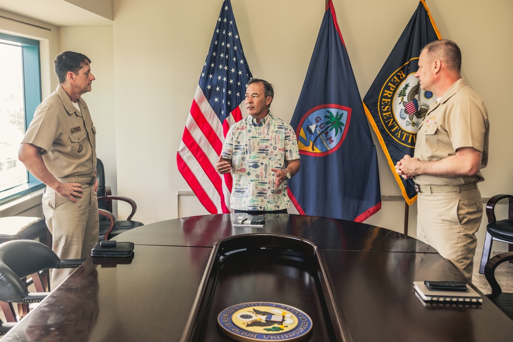 Rear Adm. Greg Huffman Introduces Rear Adm. Brent DeVore to Congressman Moylan in Guam