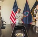 Rear Adm. Greg Huffman Introduces Rear Adm. Brent DeVore to Congressman Moylan in Guam