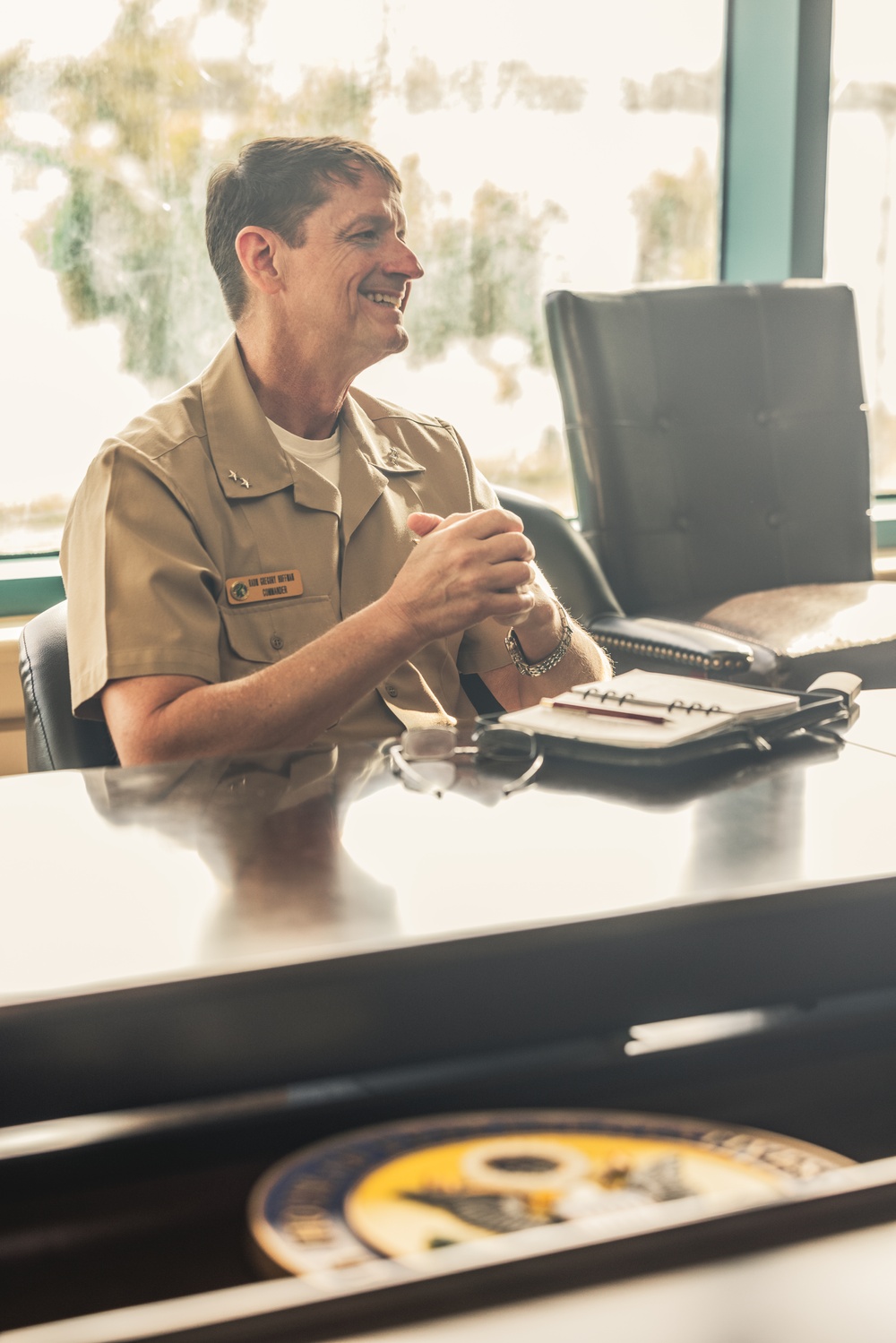 Rear Adm. Greg Huffman Introduces Rear Adm. Brent DeVore to Congressman Moylan in Guam