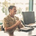 Rear Adm. Greg Huffman Introduces Rear Adm. Brent DeVore to Congressman Moylan in Guam