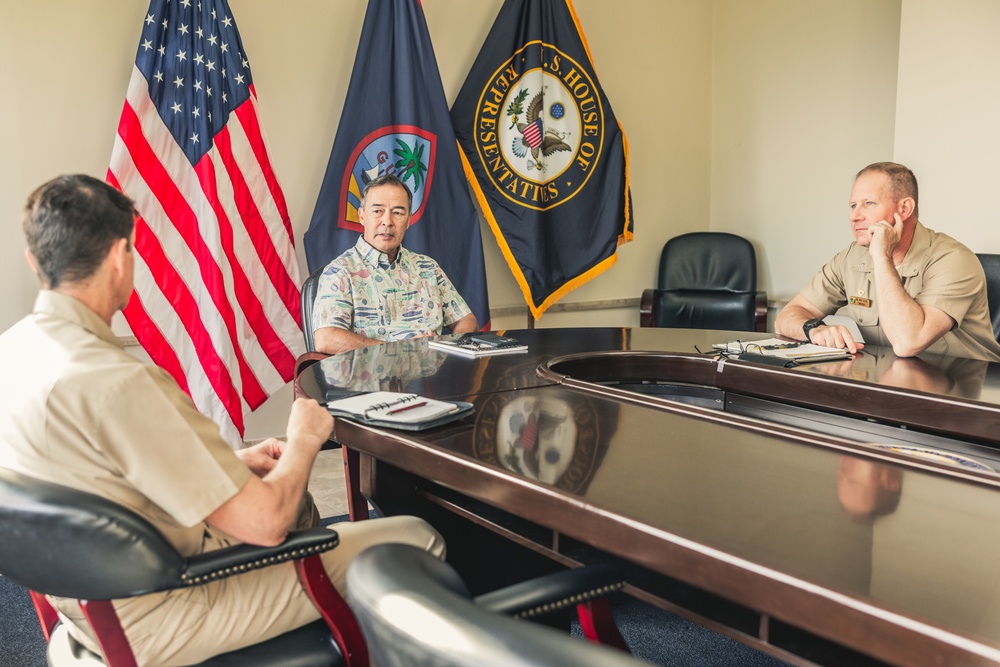 Rear Adm. Greg Huffman Introduces Rear Adm. Brent DeVore to Congressman Moylan in Guam