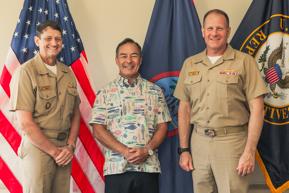 Rear Adm. Greg Huffman Introduces Rear Adm. Brent DeVore to Congressman Moylan in Guam