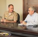 Rear Adm. Greg Huffman Introduces Rear Adm. Brent DeVore to Congressman Moylan in Guam