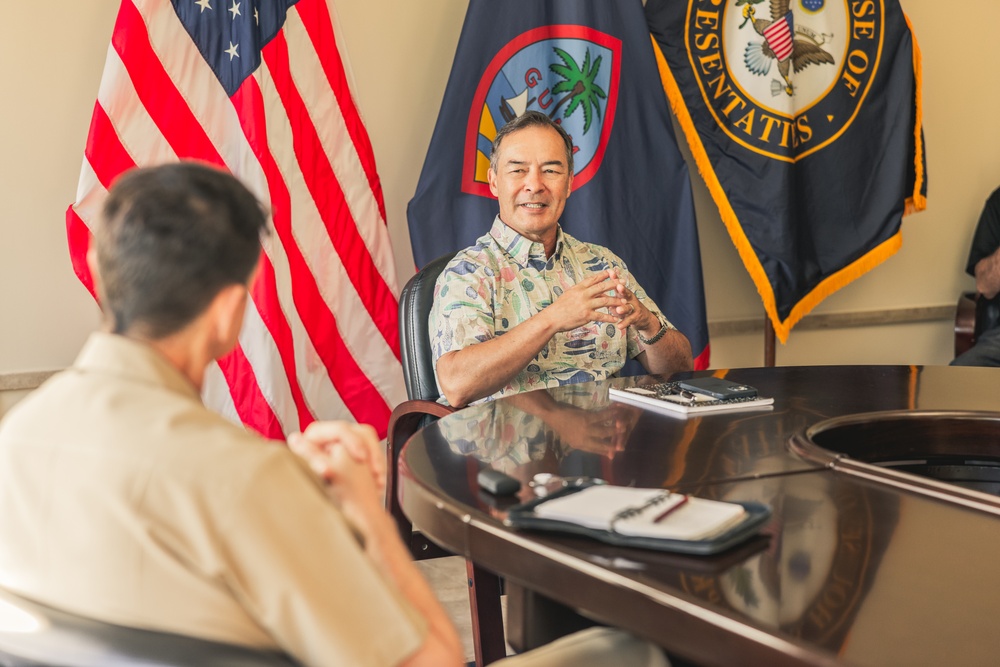 Rear Adm. Greg Huffman Introduces Rear Adm. Brent DeVore to Congressman Moylan in Guam