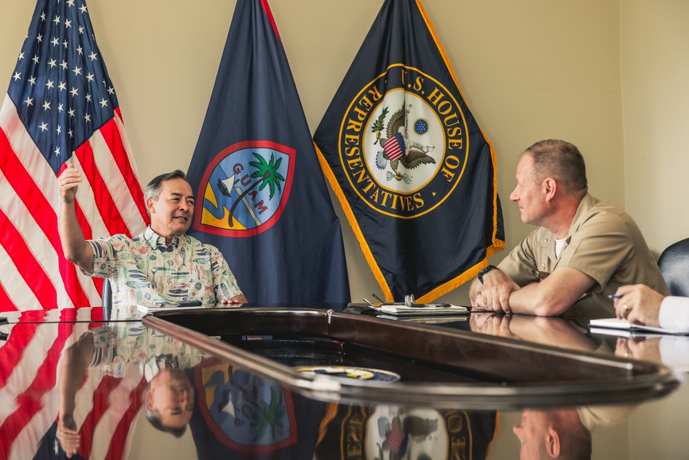 Rear Adm. Greg Huffman Introduces Rear Adm. Brent DeVore to Congressman Moylan in Guam