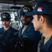 USS Ronald Reagan (CVN 76) Sailors stand watch in the  pilot house