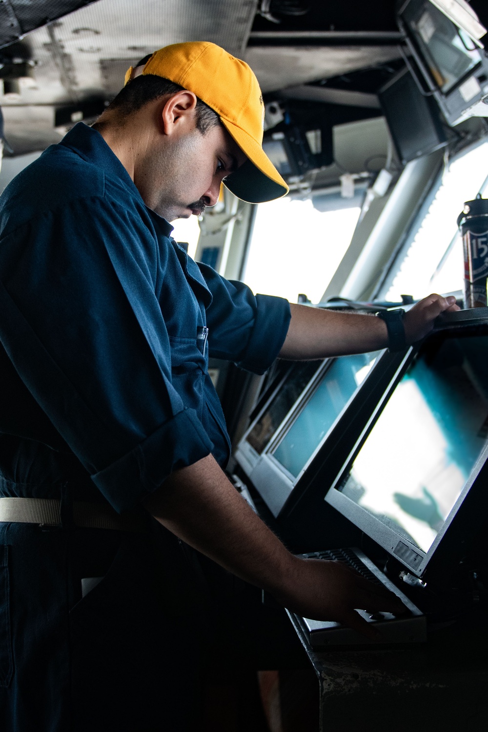 USS Ronald Reagan (CVN 76) Sailors stand watch in the  pilot house