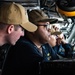 USS Ronald Reagan (CVN 76) Sailors stand watch in the  pilot house