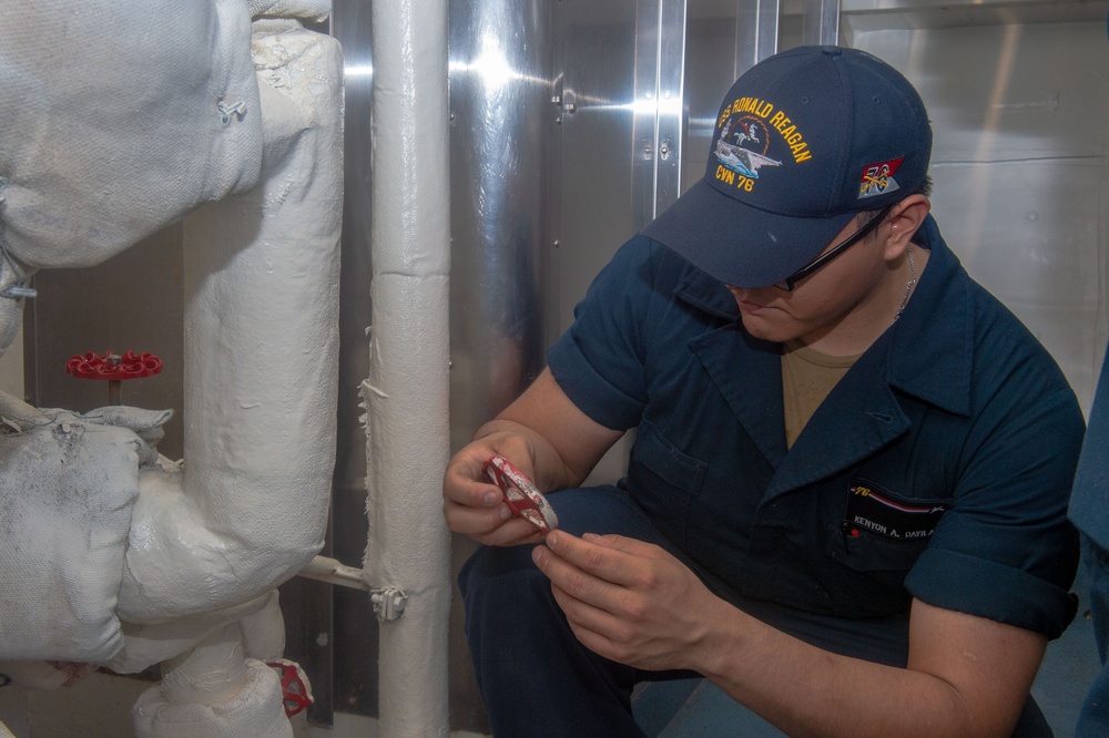 USS Ronald Reagan (CVN 76) Sailors conduct  routine maintenance