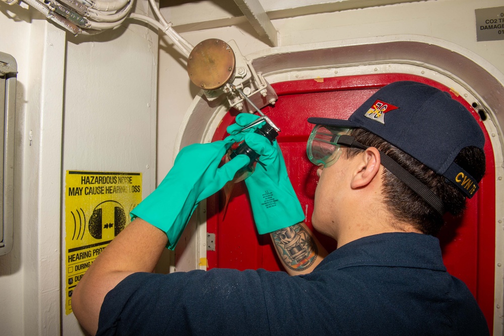 USS Ronald Reagan (CVN 76) Sailors conduct  routine maintenance