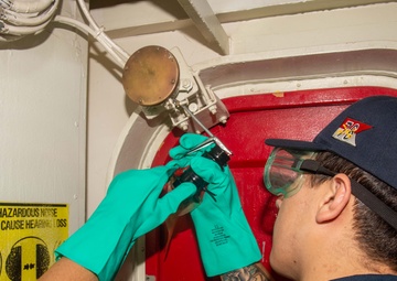 USS Ronald Reagan (CVN 76) Sailors conduct  routine maintenance