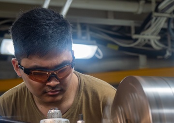 USS Ronald Reagan (CVN 76) Sailors conduct  routine maintenance